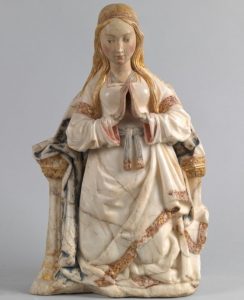 medieval sculpture of virgin is from 20th century